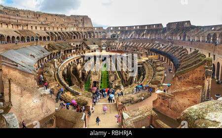 Rome, Italy - October 07, 2018: Interior of Colosseum or Flavian Amphitheatre in rainy Stock Photo
