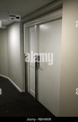 the entrance door to a goods lift (or service lift) within a hotel in South Africa Stock Photo