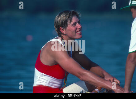 Barcelona Olympic Games 1992 Olympic Regatta - Lake Banyoles Bronze Medalist, CAN W1X. Silken LAUMANN, with her Bronze Medal,  chatting with one of the young boat holder, {Mandatory Credit: © Peter Spurrier/Intersport Images] Stock Photo