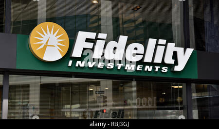 Fidelity Investments sign, logo on the branch facade of a financial ...