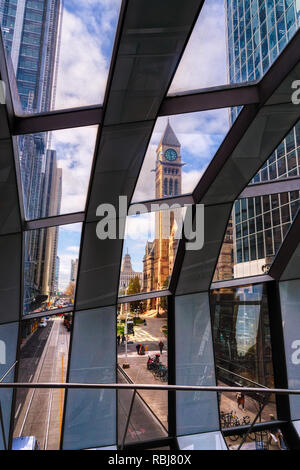 Old City Hall seen from inside the Helix Sky Bridge that links the Eaton Centre to the Hudson Bay Building, Toronto , Canada Stock Photo