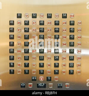 Buttons for 54 floors inside a lift Stock Photo
