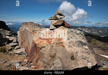 WA15731-00...WASHINGTON - A rock cairn marking the route from Spray Park to Echo Rock in Mount Rainier National Park. Stock Photo