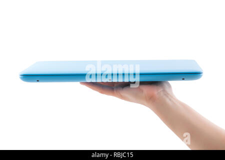 Blue closed laptop demonstrate on female hand on white background Stock Photo