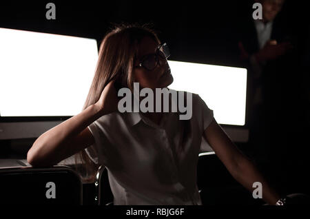 young business woman sitting in computer room. Stock Photo