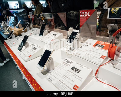 PARIS, FRANCE - NOV 23, 2017: Black Friday store shopping day in France, Paris with customers buying electronics gadget in Fnac retail chain - Apple iphone smartphones for sale  Stock Photo