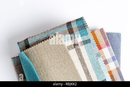 Bright collection of colorful gunny textile samples. Fabric texture background Stock Photo