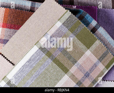 Bright collection of colorful gunny textile samples. Fabric texture background Stock Photo