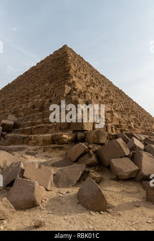 The Pyramid of Menkaure is the smallest of the three main Pyramids of Giza, located on the Giza Plateau in the southwestern outskirts of Cairo, Egypt. Stock Photo