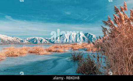 Utah lake in the winter time. It is mesmerizing when the lake is covered in ice. Stock Photo