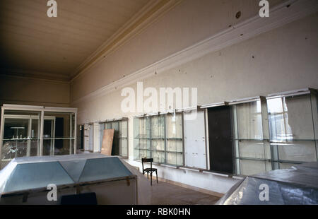 15th March 1993 During the Siege of Sarajevo: empty cabinets and damage inside the National Museum of Bosnia and Herzegovina. Stock Photo