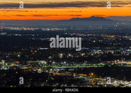 Dramatic dawn view of the San Fernando Valley neighborhoods in the city of Los Angeles, California.
