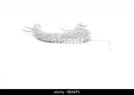Picture of thread on the white background. Stock Photo