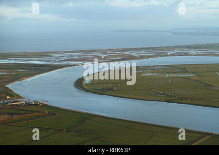Aerial view of the River Parrett and Steart Marshes Wildfowl and Wetland Trust, Somerset, UK, February 2015.  This area has been allowed to flood to create new salt marsh habitat and is an example of managed retreat. Stock Photo