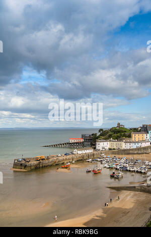 TENBY, PEMBROKESHIRE, WALES - AUGUST 2018: The harbour in Tenby, West Wales as the tide is coming in. Stock Photo