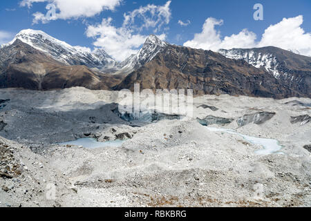 Ngozumpa glacier beside Gokyo Lake, with about 36 km the longest glacier in the Himalayas Stock Photo
