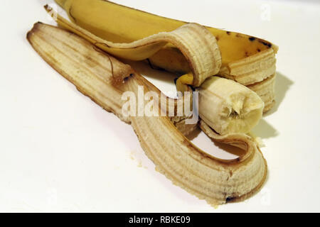 Half eaten banana. Eaten exotic fruit. Stock Photo