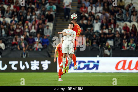 January 11, 2019 : Zhao Xuri of China heading the ball in front of John-Patrick StrauÂ§ of Philippines during Philippines v China at the Mohammed bin Zayed Stadium in Abu Dhabi, UAE, AFC Asian Cup, Asian Football championship. Ulrik Pedersen/CSM. Stock Photo