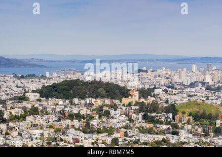 Aerial view of residential areas of San Francisco; San Francisco bay and Alcatraz island in the background, California Stock Photo