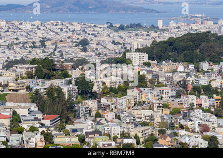 Aerial view of residential areas of San Francisco; San Francisco bay and Alcatraz island in the background, California Stock Photo