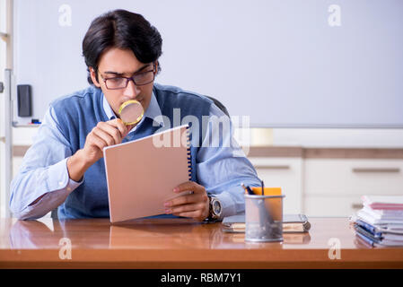 Young lecturer teacher teaching anatomy Stock Photo