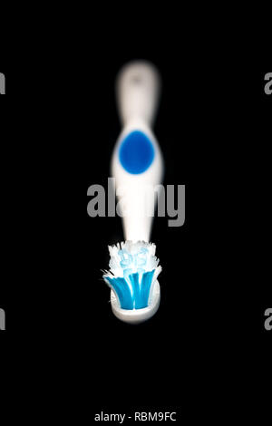 Toothbrush isolated on black background Stock Photo