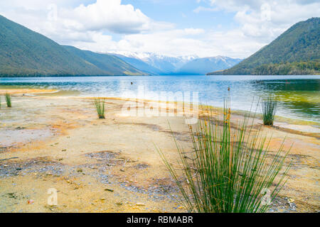 Lake Rotoroa waters edge and surrounding mountains. Stock Photo