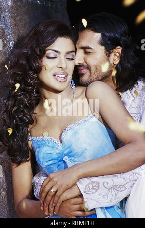 John Abraham and Priyanka Chopra embracing during shooting Stock Photo