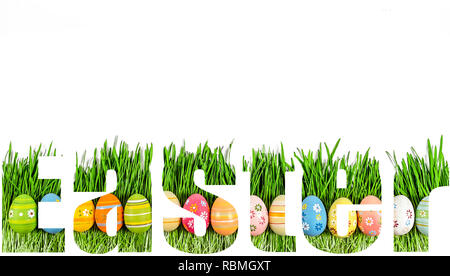 Easter font. Word Easter with transparency of green grass and Easter eggs Stock Photo