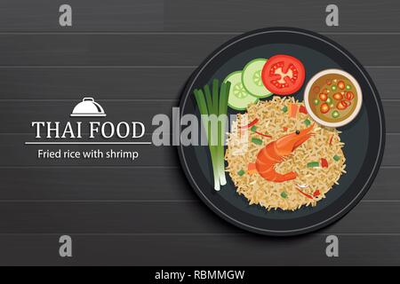 Thai food in the dish on black wooden table top view. Fried rice with shrimp. Stock Vector