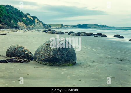 Famous spheric Moeraki Boulders at the coastline in Otago, New Zealand Stock Photo