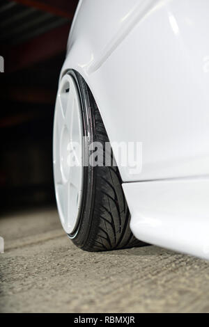 Stanced BMW E46 3 series lowered on air bag suspension and modified Stock Photo