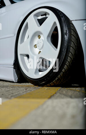 Stanced BMW E46 3 series lowered on air bag suspension and modified Stock Photo