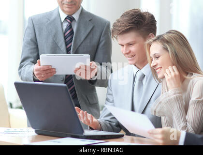 close up.businessman and business team analyzing financial data. photo with copy space Stock Photo