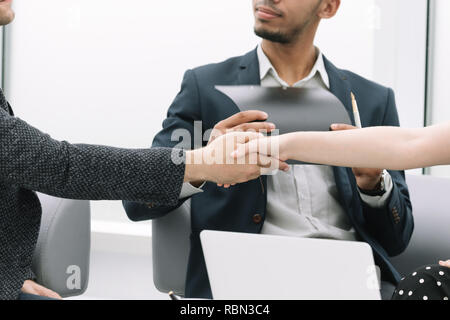 handshake of business partners after drawing up the contract Stock Photo