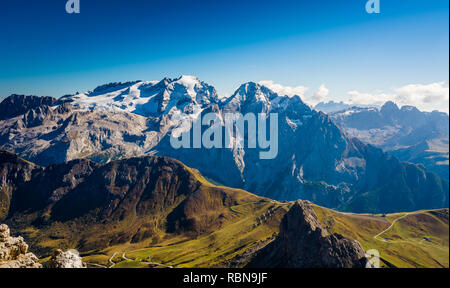 Marmolada massif, Dolomiti, northern Itay. Looking down onto the Pass Pordoi in the Dolomites on a beautiful autumnal day. Stock Photo