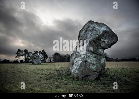 The Longstones, also known as Adam and Eve, which are the remainders of a Neolithic cove and stone avenue to the South West of Avebury in Wiltshire Stock Photo