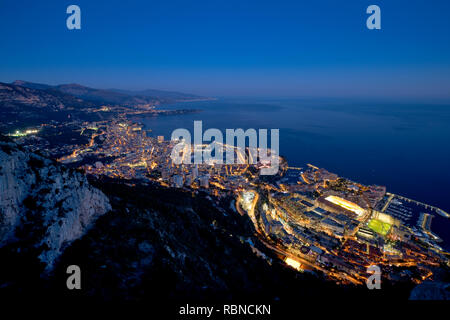 Panoramic view of Monaco from the Tête de Chien (Dog's Head) high rock promontory at dusk Stock Photo