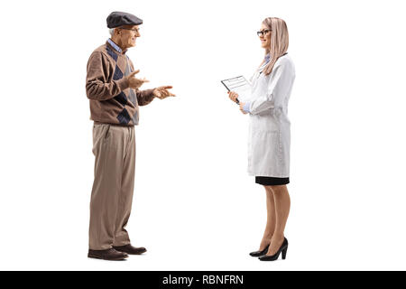 Full length shot of an elderly man talking to a female doctor isolated on white background Stock Photo