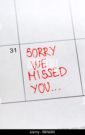 Sorry we missed you message on sticker note pin on calendar date 31st.  Business concept. Stock Photo