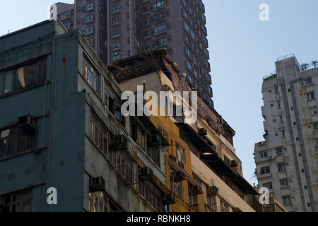 Run down apartment block in Kowloon, Hong Kong Stock Photo