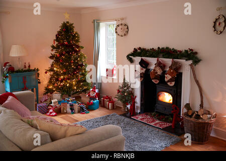 Lounge Decorated For Christmas With Tree And Presents Stock Photo