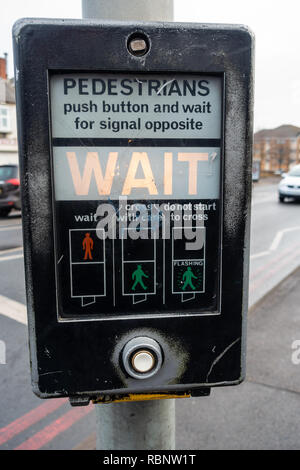 Close up view of the control box and push button on a pedestrian crossing. Stock Photo