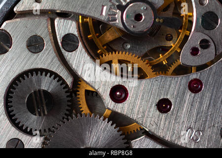 Pocket watch mechanism in close detail, macro Stock Photo