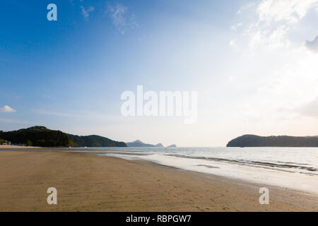 Sunny Pantai Cenang beach on tropical Langkawi island in Malaysia. Beautiful nature of south east asia. Stock Photo