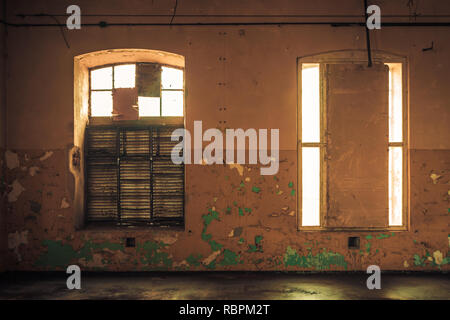 Dark interior inside abandoned old factory building Stock Photo