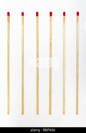 Many matches sticks for lighting a fire on white background. Stock Photo