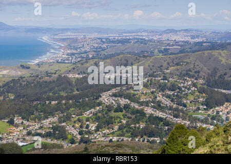 Aerial view of Pacifica and San Pedro Valley as seen from Montara mountain, San Francisco and Marin County in the background, California Stock Photo