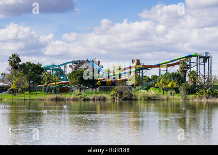 Water slide on the shoreline of a pond, Cunningham Lake, San Jose, south San Francisco bay, California Stock Photo