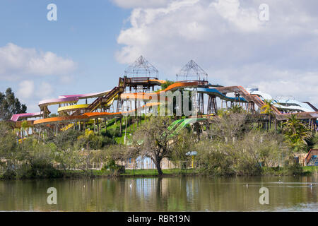 Water slide on the shoreline of a pond, Cunningham Lake, San Jose, south San Francisco bay, California Stock Photo